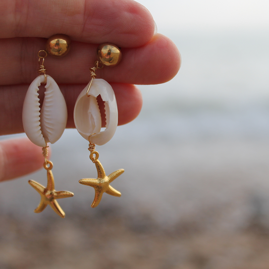 Gold Sea Shell And Star Fish Dangly Earrings