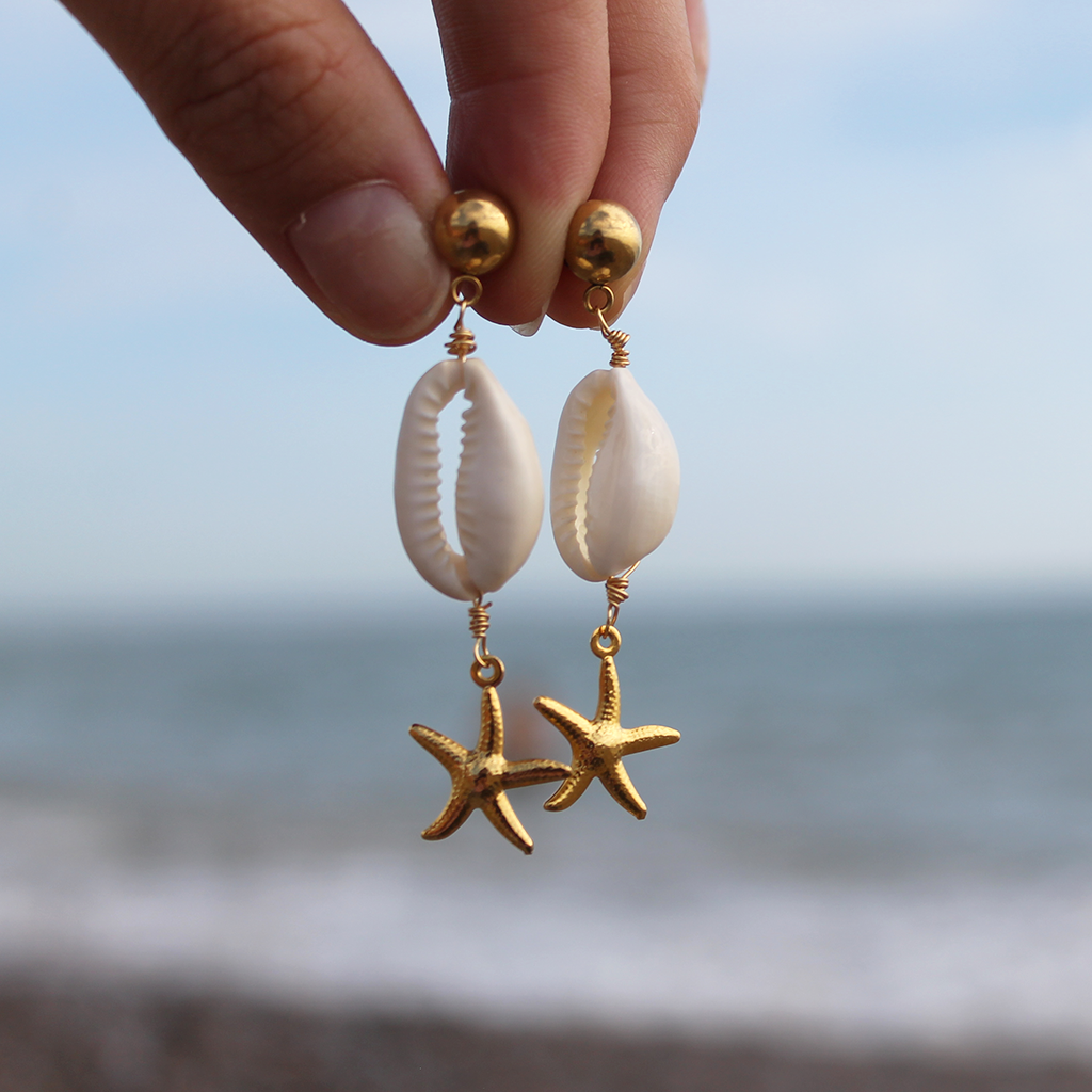 Gold Sea Shell And Star Fish Dangly Earrings